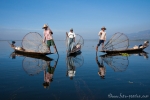 Fischer mit traditionellen Reusen auf dem Inle See